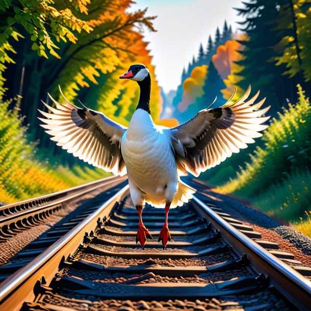 Imagen de un salto de un ganso en las vías del ferrocarril