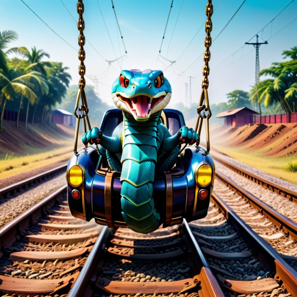 Image of a swinging on a swing of a cobra on the railway tracks